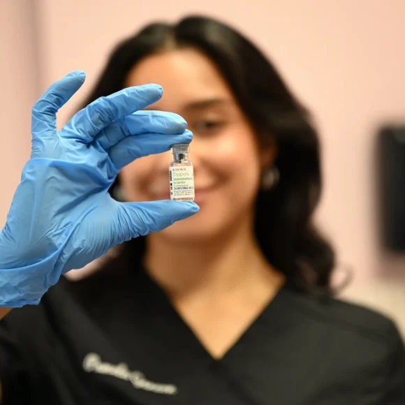 dermfx provider holding a vial of dysport