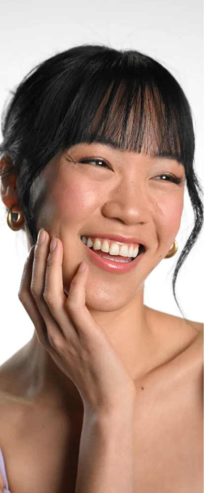 client touching healthy skin